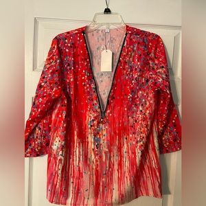 Red blouse, size large.